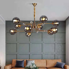  Postmodern glass bubble chandelier with multiple glass spheres and exposed bulbs. Golden Atelier 2