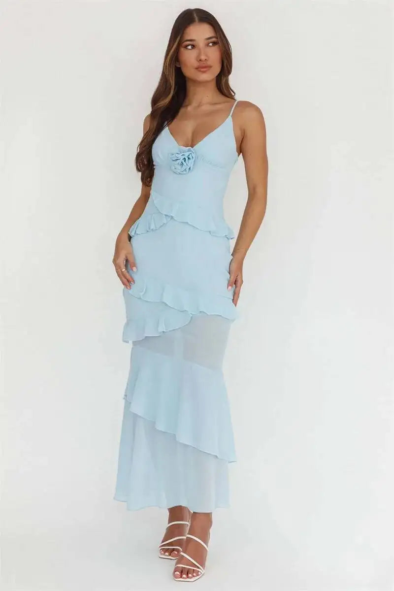 Light blue spaghetti strap maxi dress with rose embellishment and ruffles