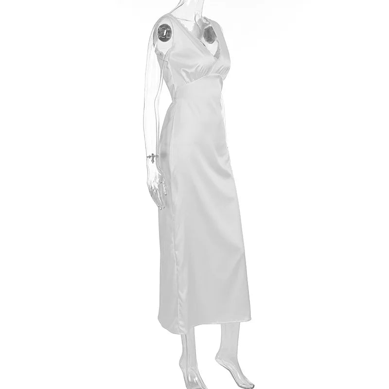 White satin nightgown on a mannequin against a white background