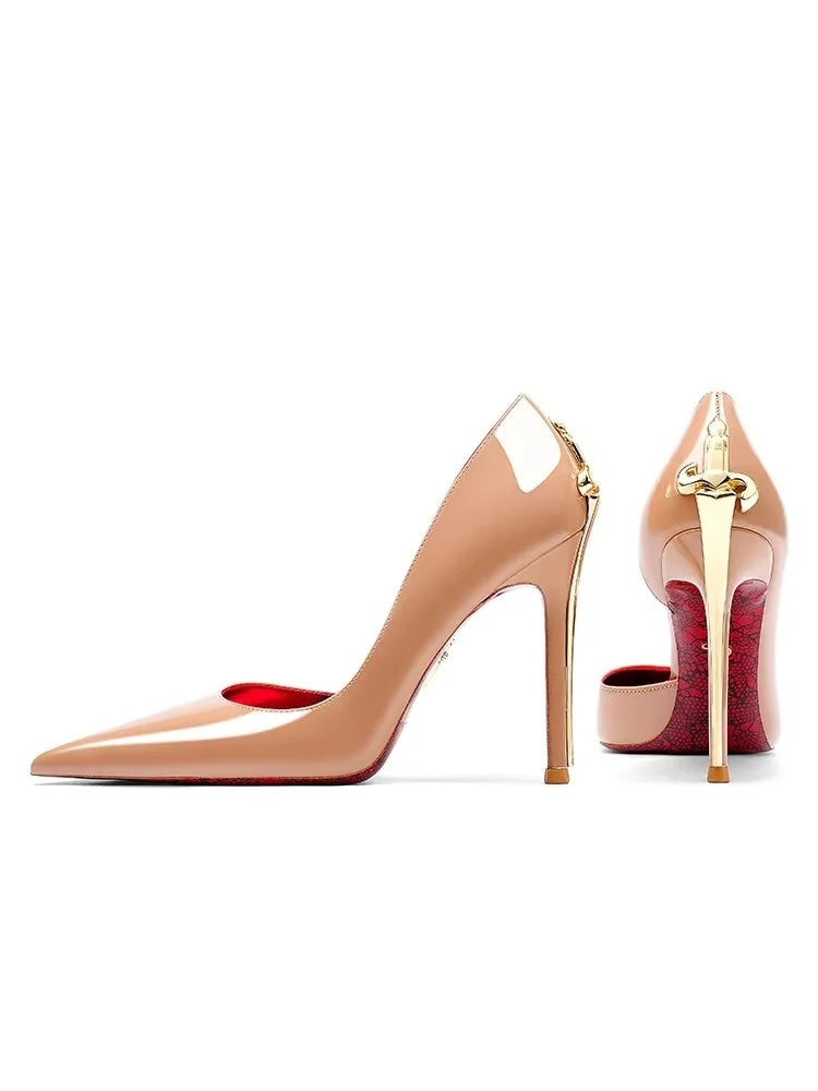 Beige high-heeled shoes with gold accents on a white background