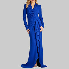 Blue evening gown with ruffled details on a white background