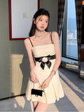 White Pleated Black Bow Tube Mini Dress