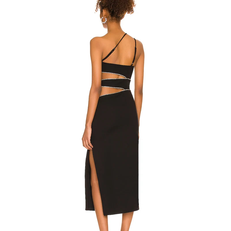 Back view of black one-shoulder midi dress with diamond chain cutouts