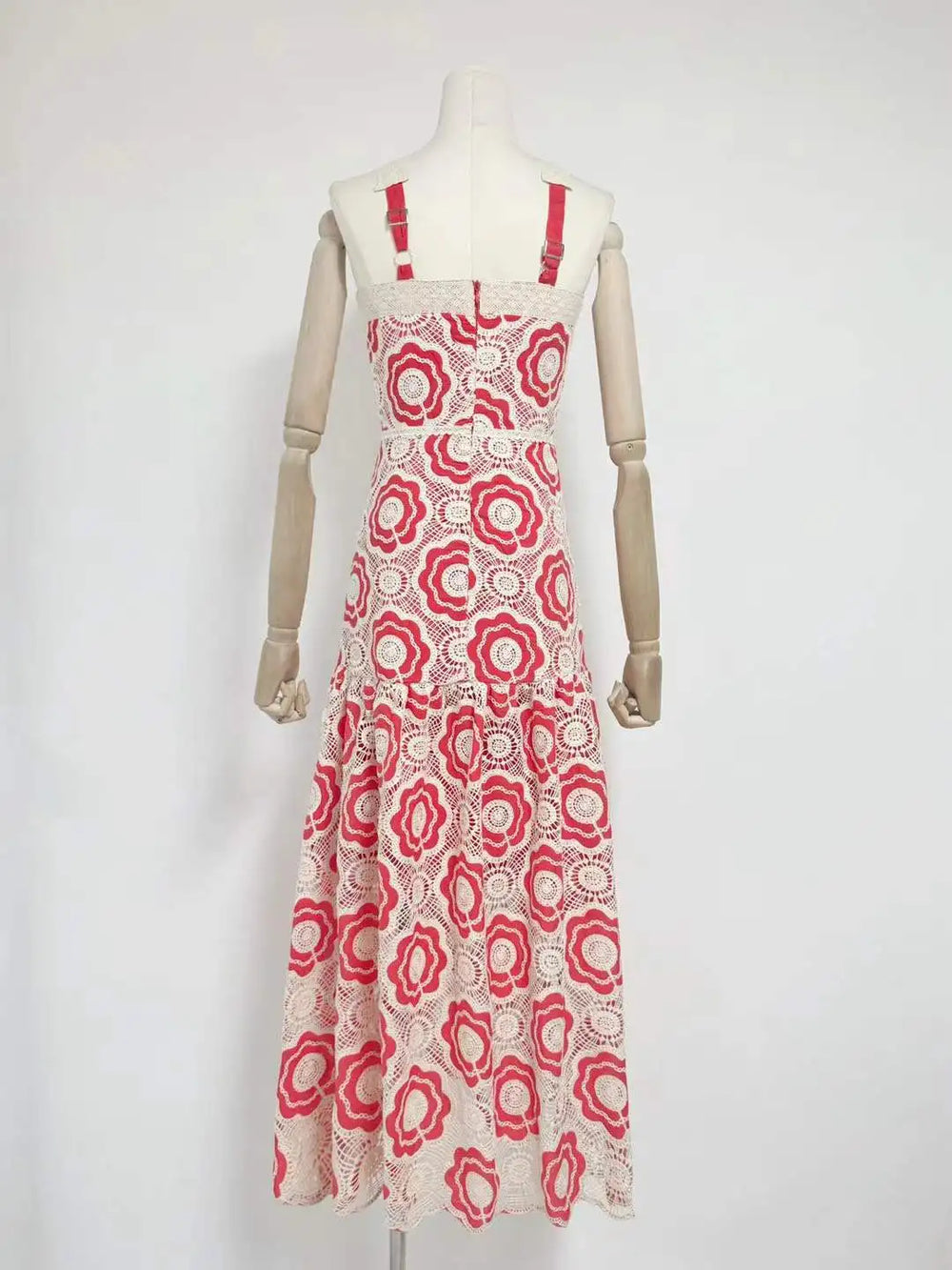 Back view of floral crochet halter maxi dress on mannequin