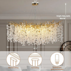 A sparkling crystal branch chandelier illuminating a modern dining room. 2