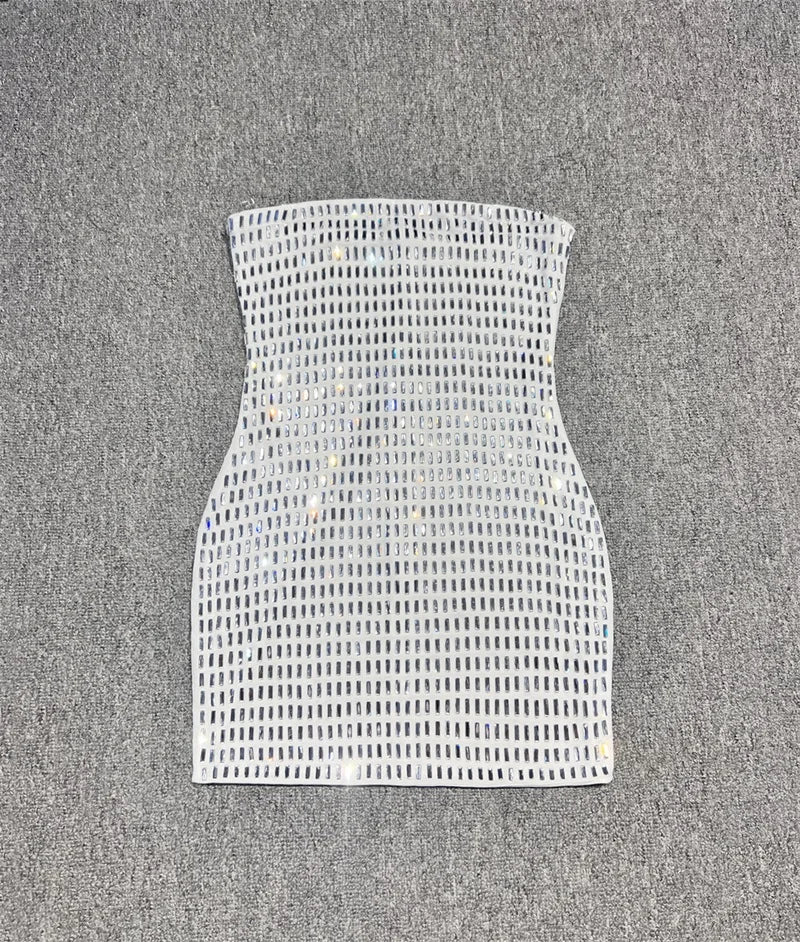 White strapless top with a grid pattern on a grey background