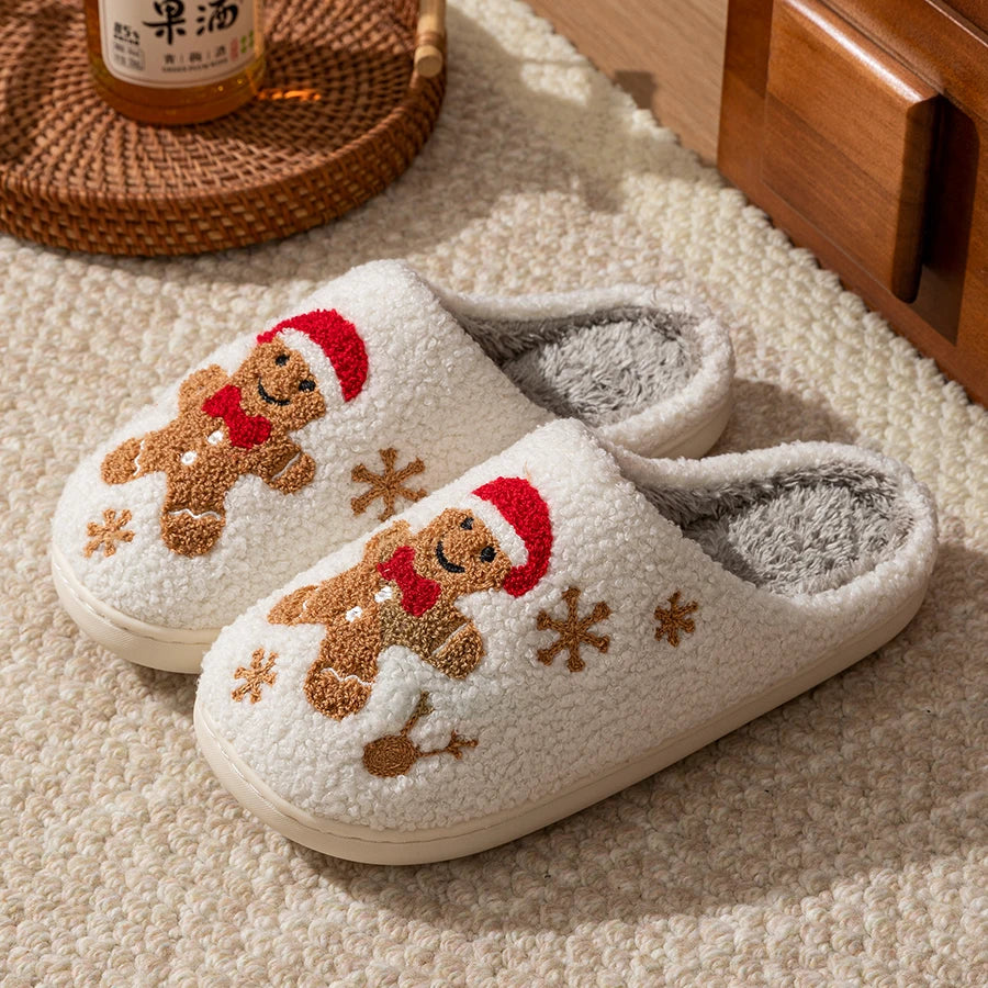 Top view of gingerbread man slippers on a rug