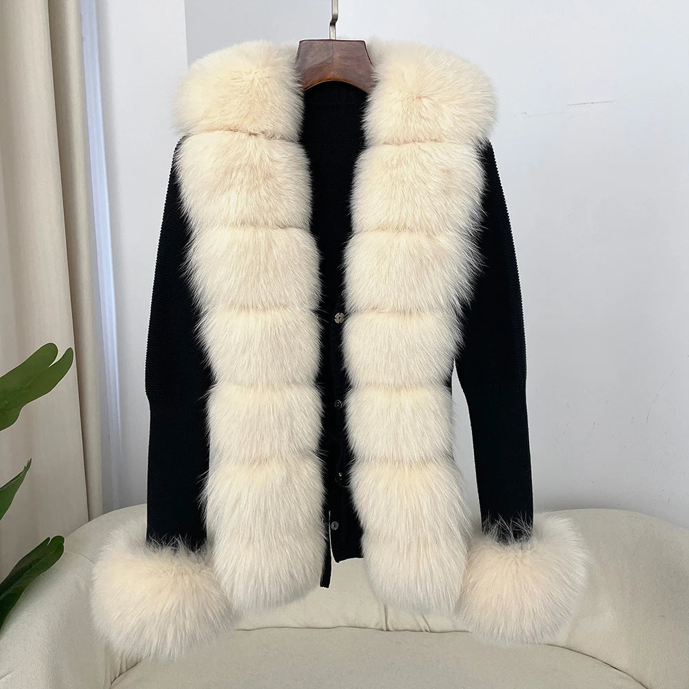 black knit cardigan with cream faux fur trim