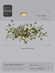 Chandelier with green leaves on a gray background