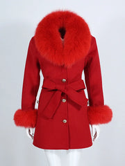Red coat with fur trim on a white background