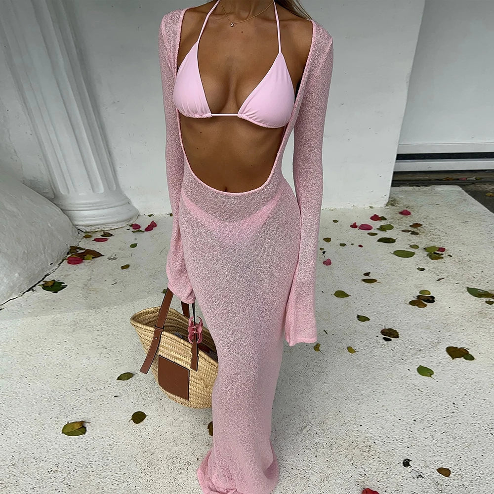 Close-up of a ribbed knit long sleeve cover-up and bikini bathing suit set.
