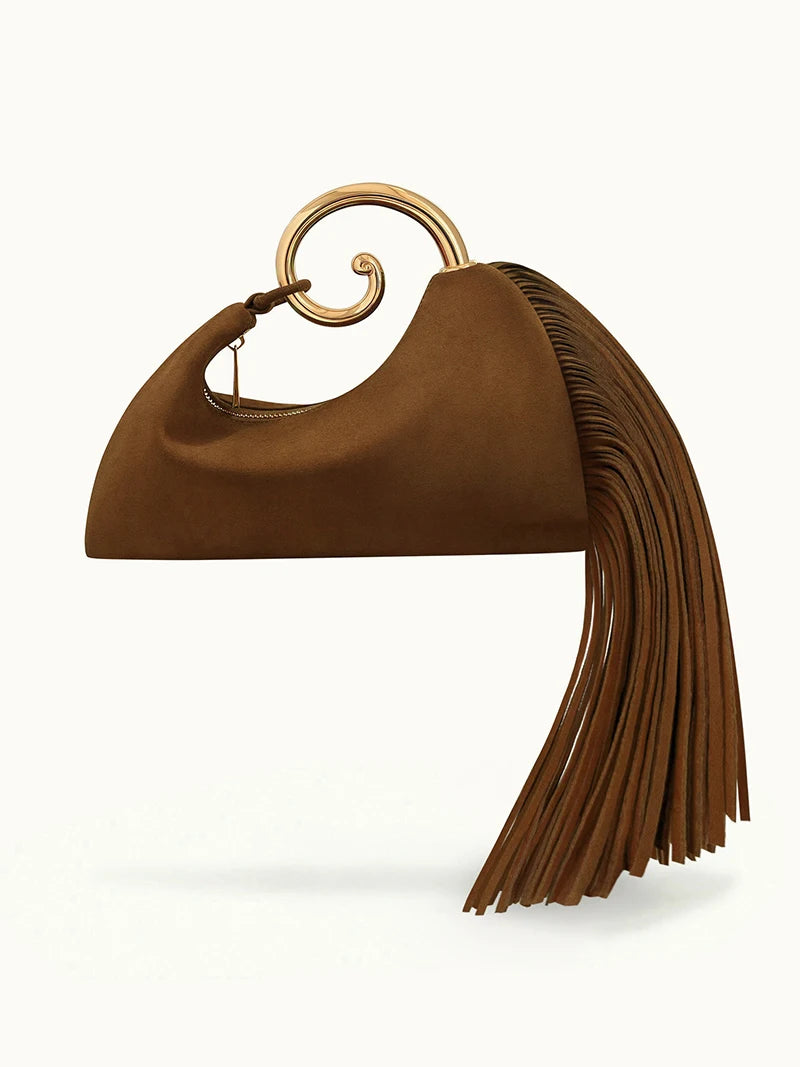 Brown fringed swirl handle bag detail