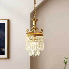 A charming French-style chandelier with a retro copper finish and crystal accents, hanging in a cozy bedroom.