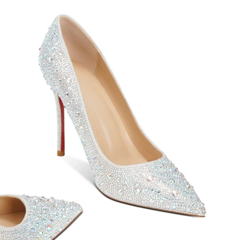 Silver stiletto shoe with red sole
