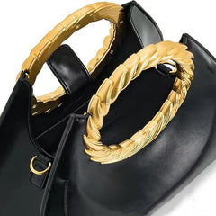 Sculptural Ring Handle Triangular Bag