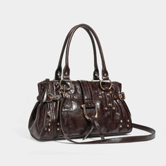Brown structured shoulder bag with gold-tone hardware and lock charm, angled view
