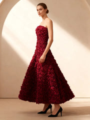 Strapless burgundy formal dress with mid-calf silhouette