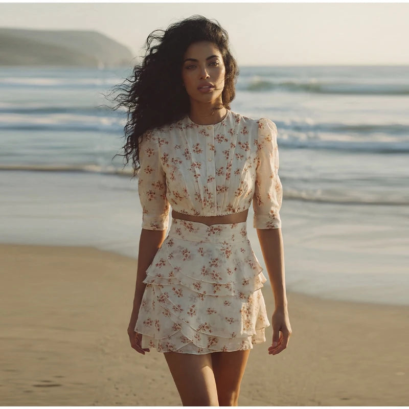 Floral print cropped top and ruffled skirt set on beach