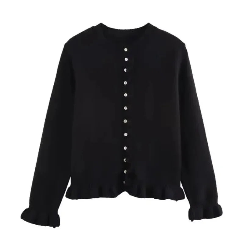 Black cardigan with buttons on a white background