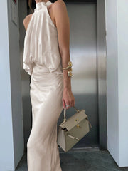 Halter neck solid maxi dress with draped waist close up