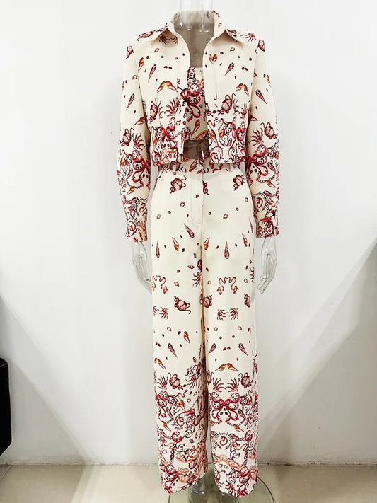 White three-piece suit set with sea world print displayed on a mannequin.