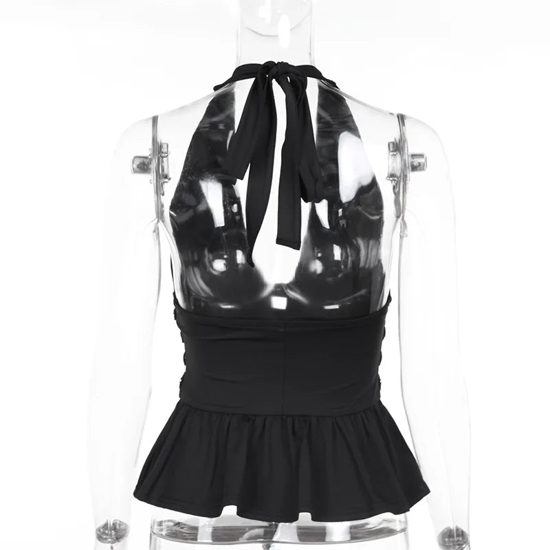 Black halter top with transparent back on a mannequin against a white background