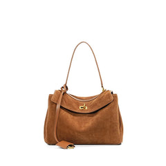 Light Brown handbag with a gold clasp on a white background
