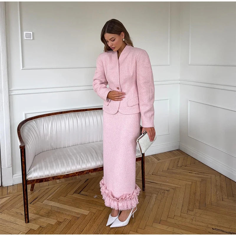 Full view of the tweed jacket and skirt set.