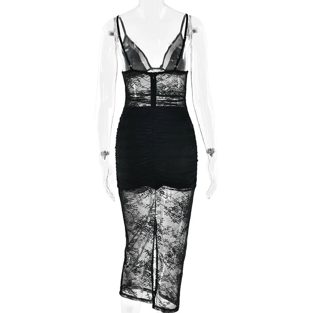 Black lace dress on a mannequin against a white background