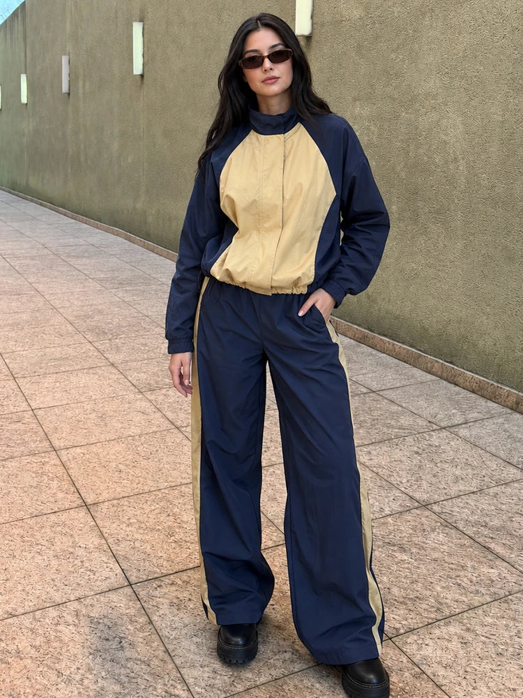 Colorblock jacket and wide-leg trousers set on model