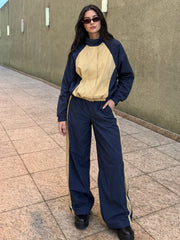 Colorblock jacket and wide-leg trousers set on model