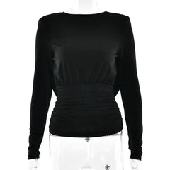 Black long-sleeve top on a mannequin against a white background