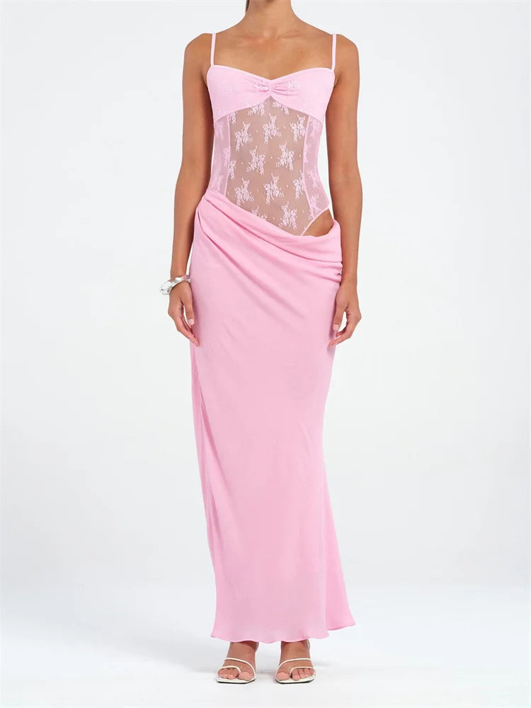 Pink dress with lace detailing on a white background