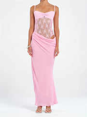 Pink dress with lace detailing on a white background