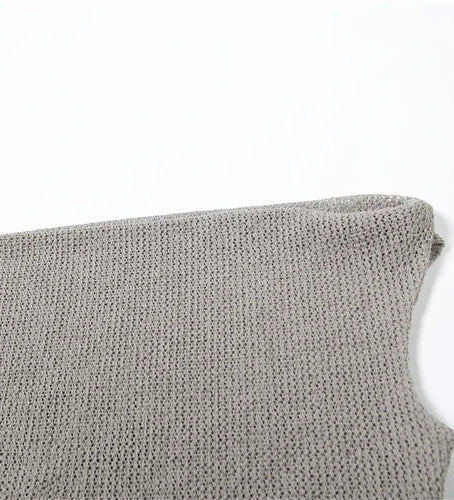 Gray knitted sleeveless garment on a white background
