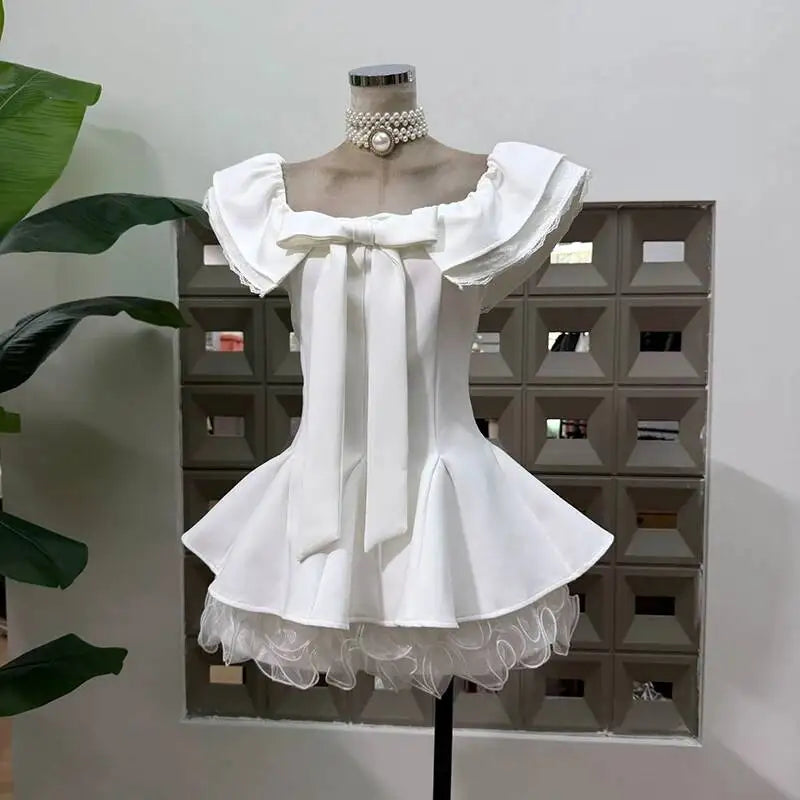 Off-shoulder bow frill mini dress in white