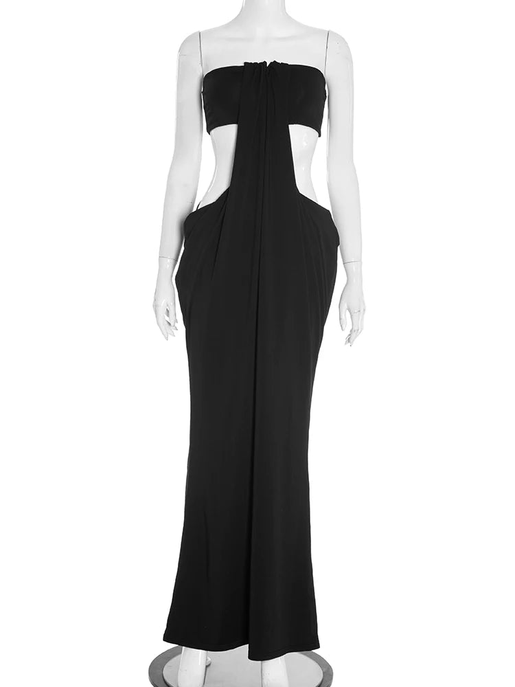 Black strapless gown on a mannequin against a white background