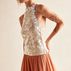 Ivory sequin halter neck top with lace trim and orange skirt
