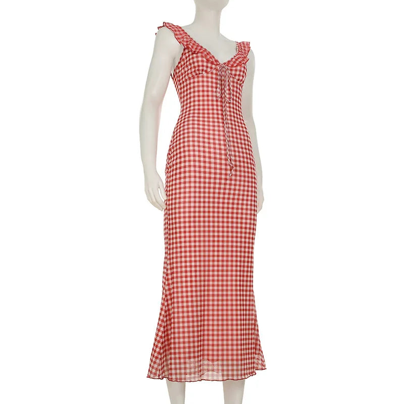 Red and white checkered dress on a mannequin against a white background