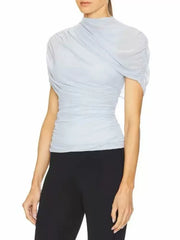 Three-quarter view of draped mock neck short sleeve top
