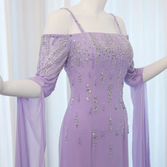 Close-up of the beadwork and elegant cape sleeves on the lilac mermaid gown.  Golden Atelier 4