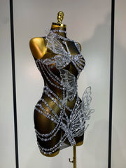 Side view of crystal butterfly mini dress with sheer mesh