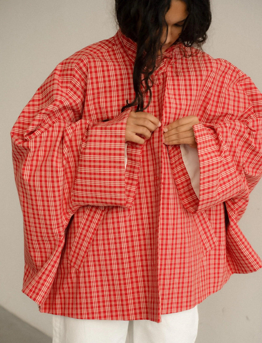 Plaid stand up collar jacket close-up on closure
