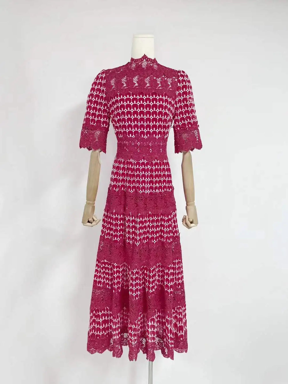 Lace mock neck short sleeve midi dress on mannequin