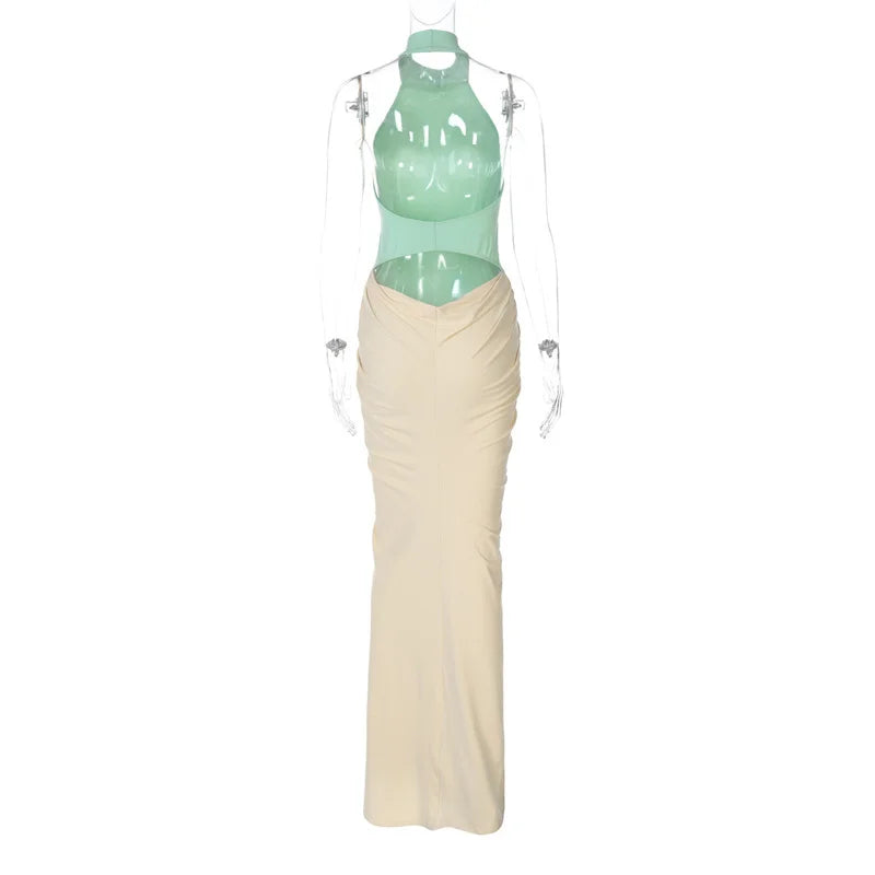 Mannequin wearing a green halter top and beige skirt on a white background