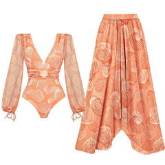 Orange long sleeve v-neck ruched one-piece swimsuit and flowy maxi skirt set with seashell print