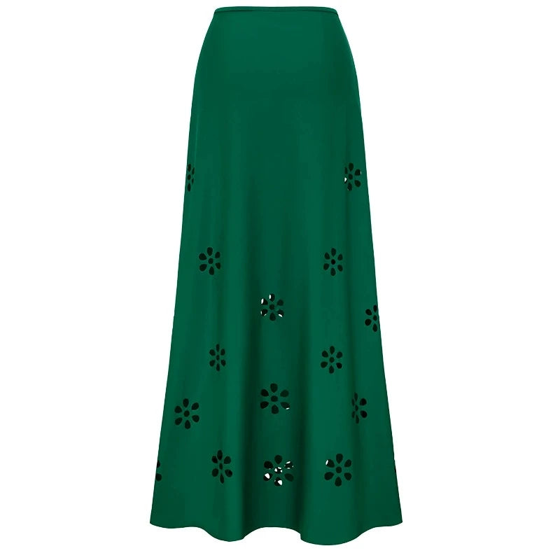 Green maxi skirt with cut-out floral details.