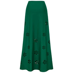 Green maxi skirt with cut-out floral details.