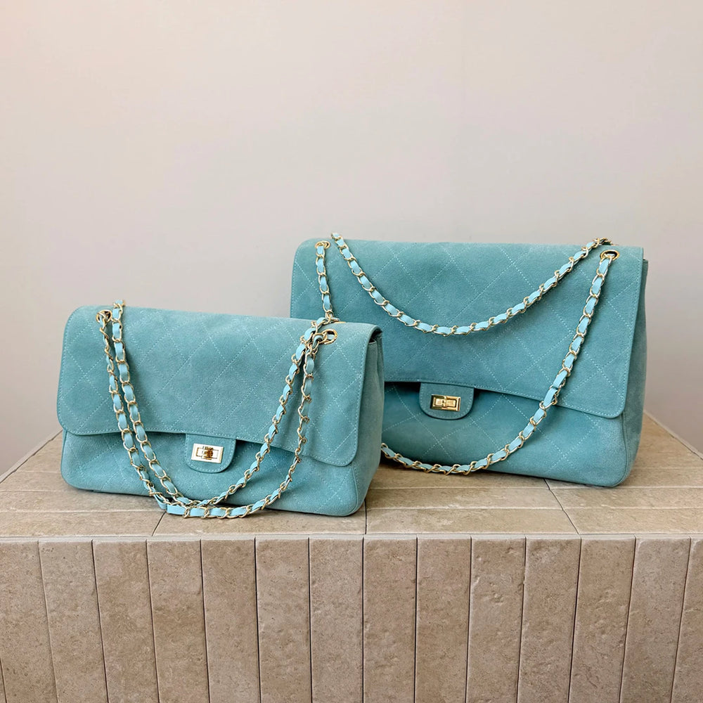 Light blue quilted suede flap shoulder bag