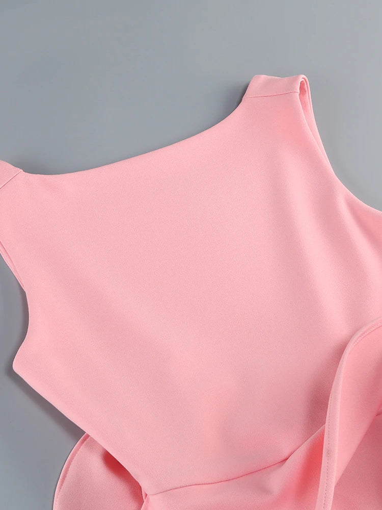 Pink sleeveless top on a gray background